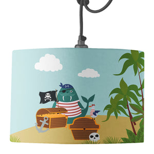 A blue drum lampshade featuring a walrus pirate ,seagull first mate, desert Island and treasure design on a pendant fitting.