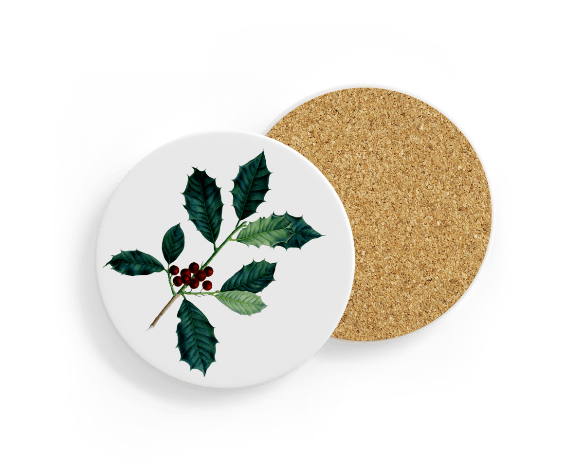 Round ceramic coaster with a botanical holly design, featuring dark green spiky leaves and clusters of red berries on a white background. The reverse side shows a natural cork backing.