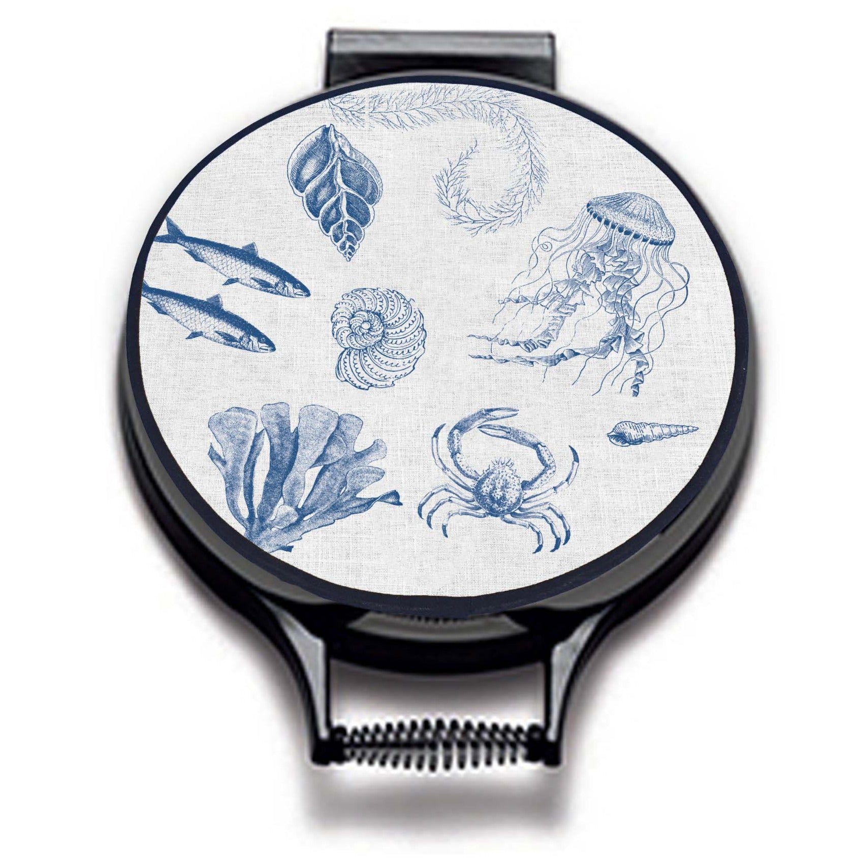 blue illustrations of sealife including fish, seaweed, shells, crabs, jelly fish, and fossils on a beige linen circular hob cover with black hemming. Pictured on metal range cooker lid on an isolated background. Mustard and Gray