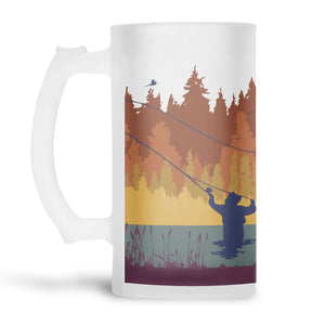 Autumn Fly Fishing handled frosted glass beer stein with autumnal trees in orange and yellow, blue water, purple reeds  and navy fly fisherman. Luxury mens gifts from Mustard and Gray