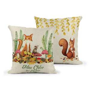 A Picture of the front and back of a linen effect cushion featuring a fox mouse and squirrel amongst leaves and toadstools. With personalised name. Made by Mustard and Gray.