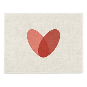 Toco Heart Placemat. Single linen effect placements featuring a graphic heart design made from two overlaid ovals, one in pink and one in red. Mustard & Gray Placemats.
