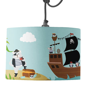 A blue drum lampshade featuring a pirate ship, pirates, desert Island and treasure design on a pendant fitting.