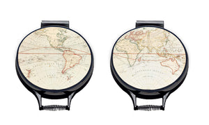 Set of two. vintage atlas world map print on a beige linen circular hob cover with black hemming. Pictured on metal aga lid on an isolated background. Mustard and Gray