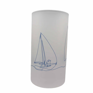 Blue line drawing of sailing boats, dingies, yachts around a frosted glass beer stein from mustard and gray