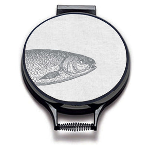 Grey fish illustration print on a beige linen circular hob cover with black hemming. Fish head on one hob cover. Pictured on metal aga lid on an isolated background. Mustard and Gray