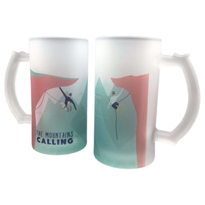 Rock climbing with The mountains are calling slogan printed onto a frosted glass beer stein from Mustard and Gray